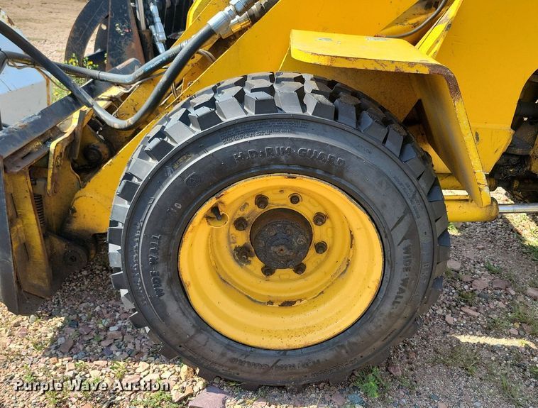 image for item DR4430 1997 NMC Wollard Swinger AG2000 wheel loader