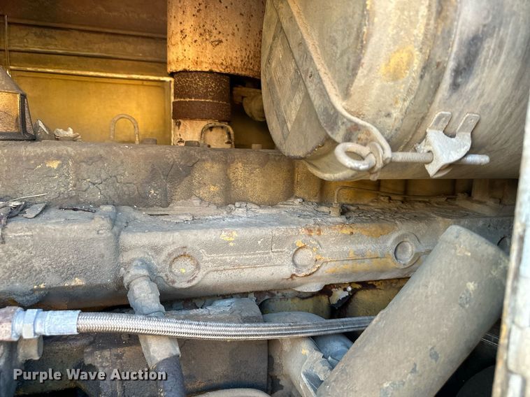 image for item EJ7214 1990 Caterpillar 12G rigid frame motor grader