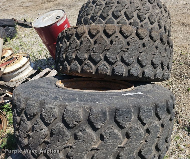 image for item NX9068 (4) 17.5R25 tires and wheels