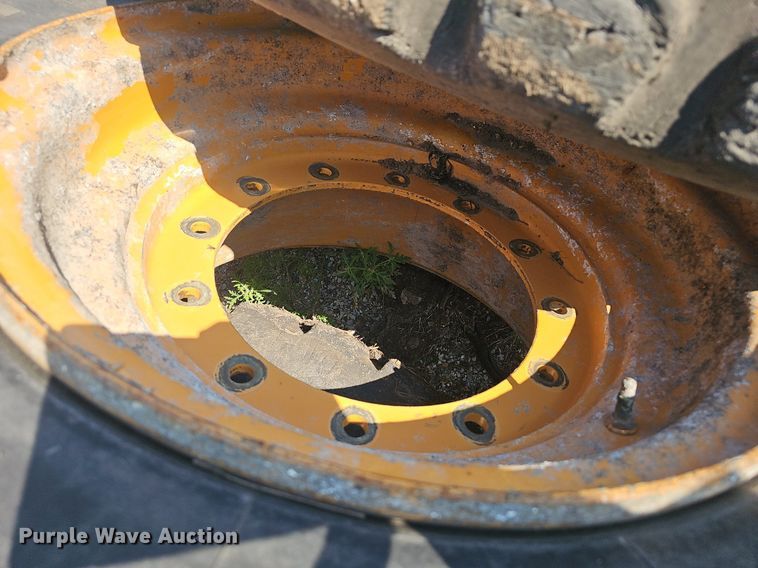 image for item NX9068 (4) 17.5R25 tires and wheels