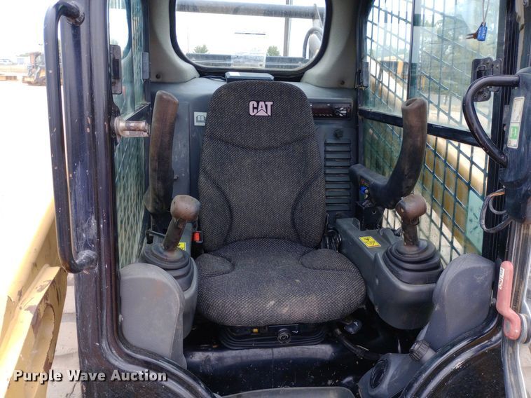 image for item NY9428 2016 Caterpillar 289D skid steer loader