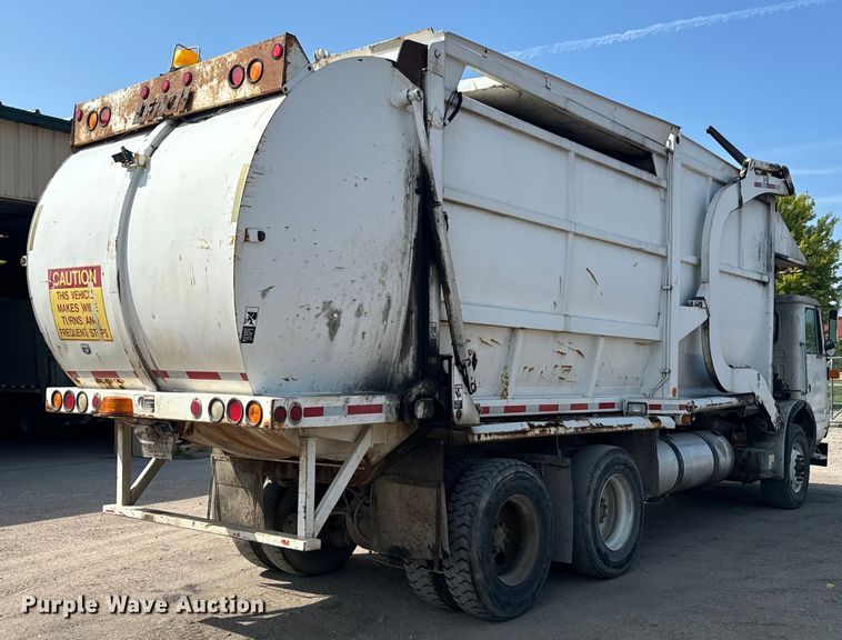 image for item EE7502 2001 Volvo WX64 refuse truck