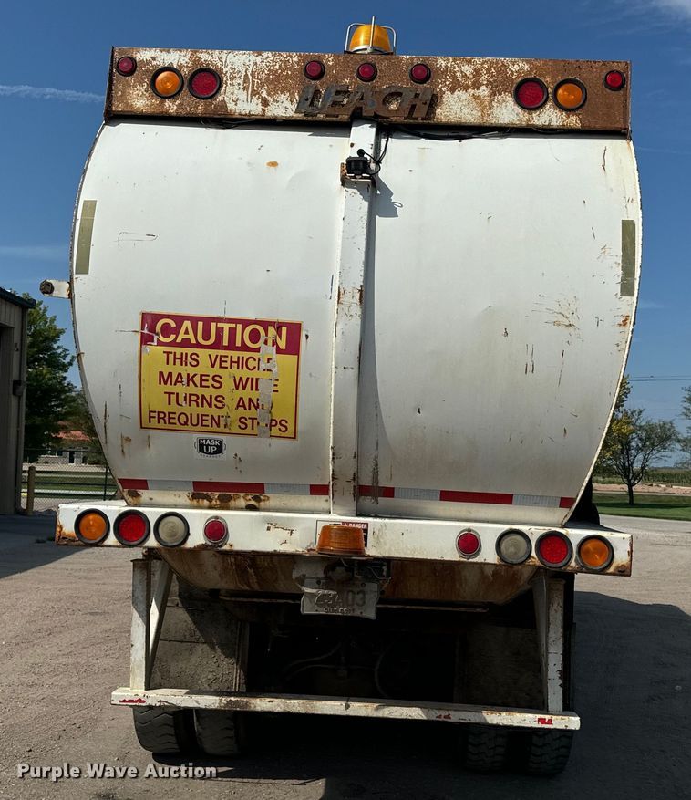 image for item EE7502 2001 Volvo WX64 refuse truck