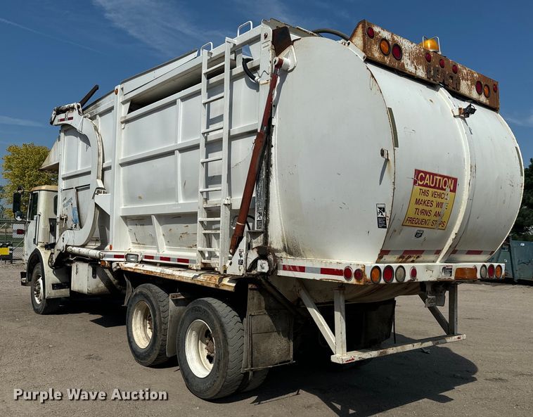 image for item EE7502 2001 Volvo WX64 refuse truck