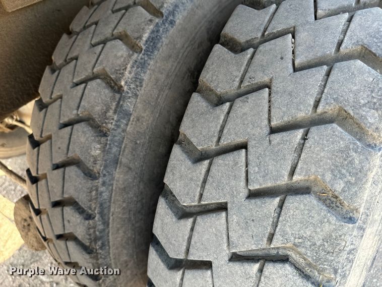 image for item EE7502 2001 Volvo WX64 refuse truck