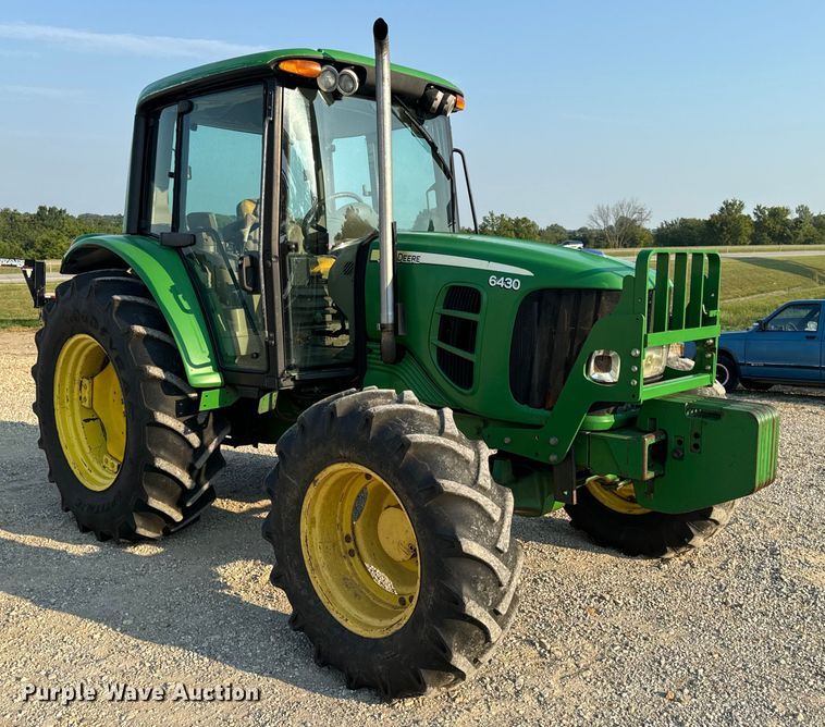 image for item EH6995 2010 John Deere 6430 Premium MFWD tractor