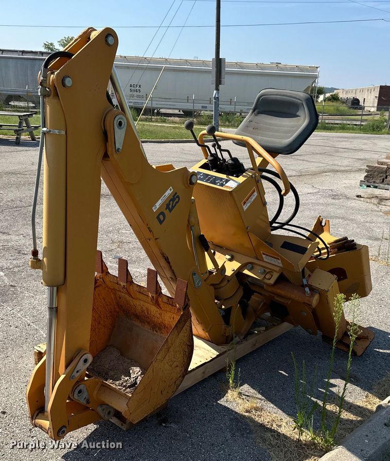 image for item EJ7090 Case D125 skid steer backhoe