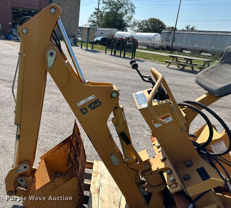 image for item EJ7090 Case D125 skid steer backhoe