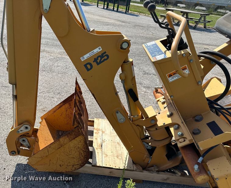 image for item EJ7090 Case D125 skid steer backhoe