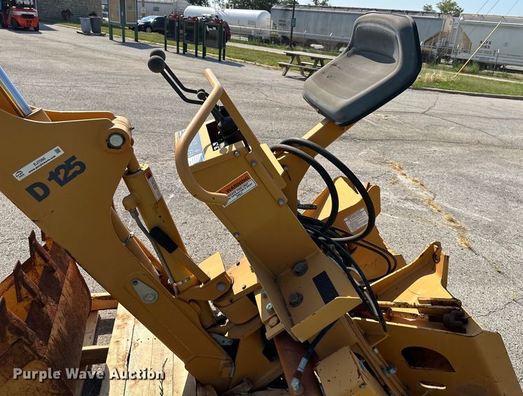 image for item EJ7090 Case D125 skid steer backhoe