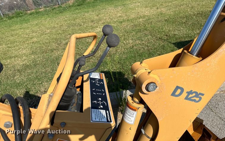 image for item EJ7090 Case D125 skid steer backhoe