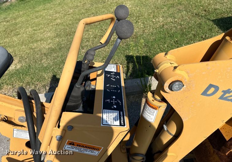 image for item EJ7090 Case D125 skid steer backhoe