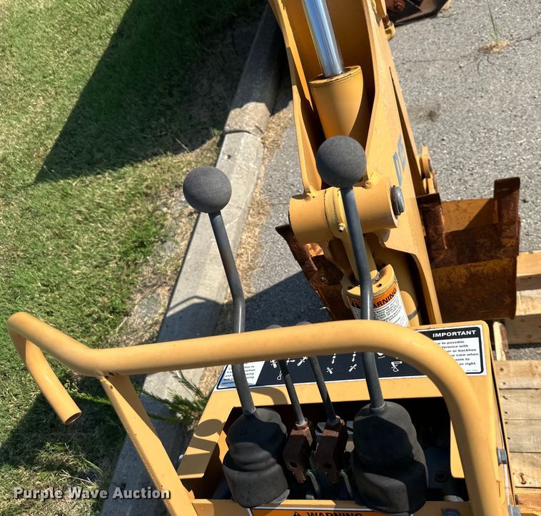 image for item EJ7090 Case D125 skid steer backhoe