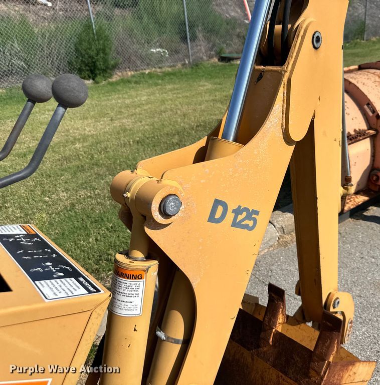 image for item EJ7090 Case D125 skid steer backhoe