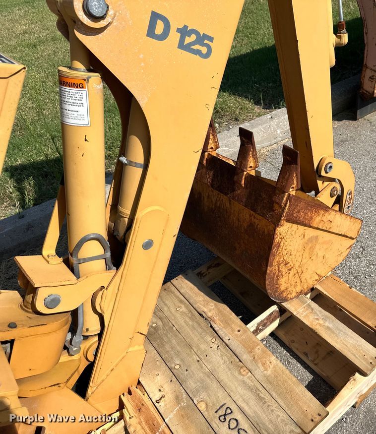 image for item EJ7090 Case D125 skid steer backhoe