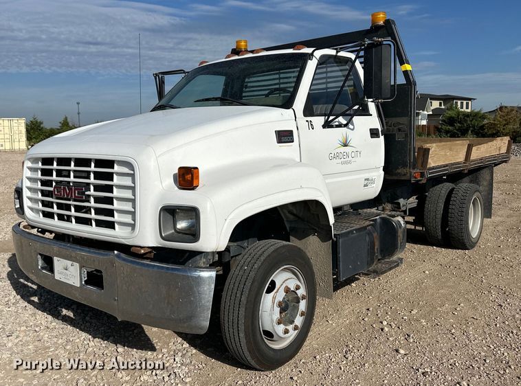 image for item OM9648 2000 GMC C6500 dump flatbed truck