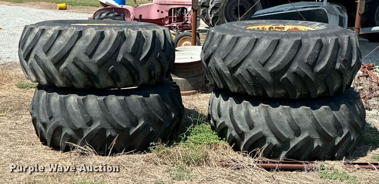 image for item DX1109 (4) Titan 23.1-26 floatation tires and wheels