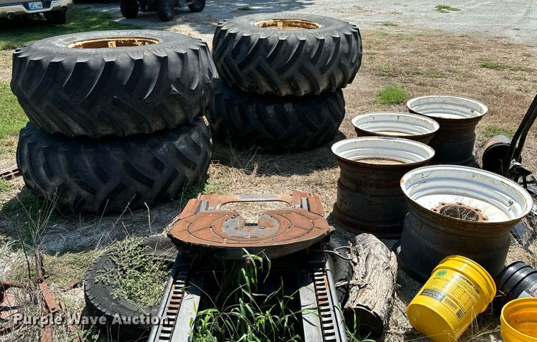 image for item DX1109 (4) Titan 23.1-26 floatation tires and wheels