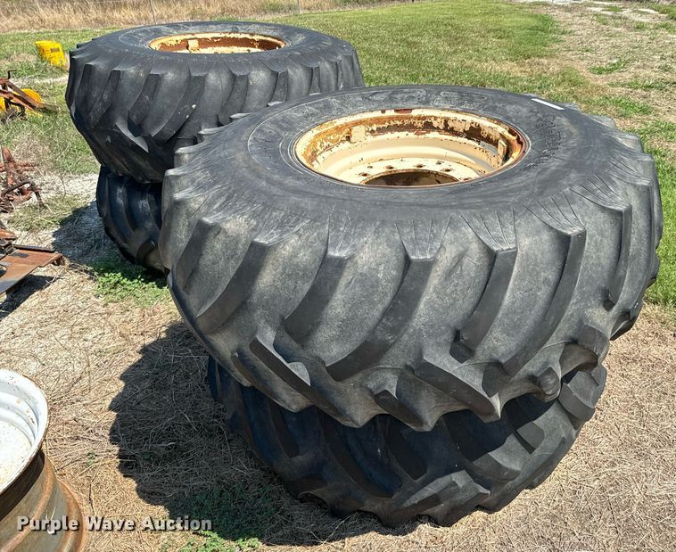 image for item DX1109 (4) Titan 23.1-26 floatation tires and wheels