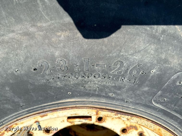 image for item DX1109 (4) Titan 23.1-26 floatation tires and wheels