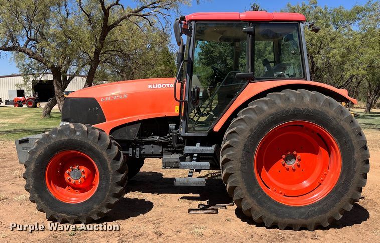image for item EJ2955 Kubota  M135X MFWD tractor