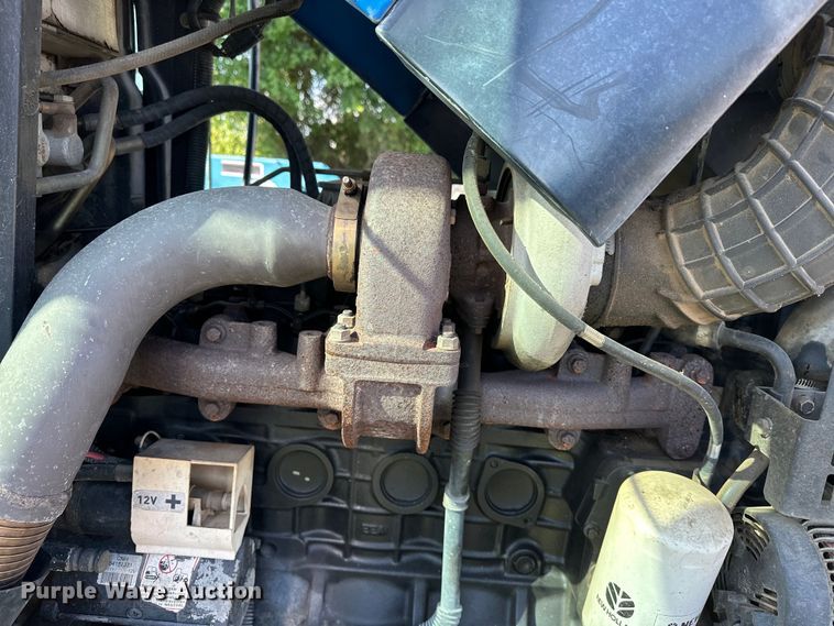 image for item EJ8877 2004 New Holland  TS115A MFWD tractor