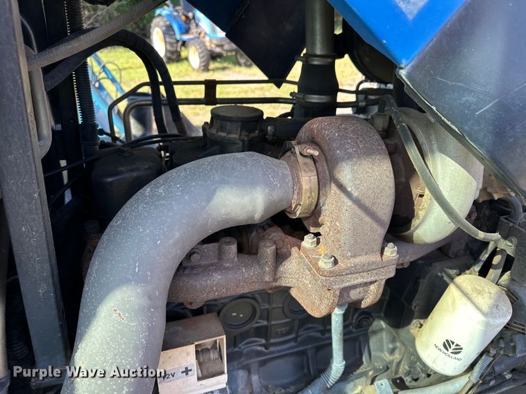 image for item EJ8877 2004 New Holland  TS115A MFWD tractor