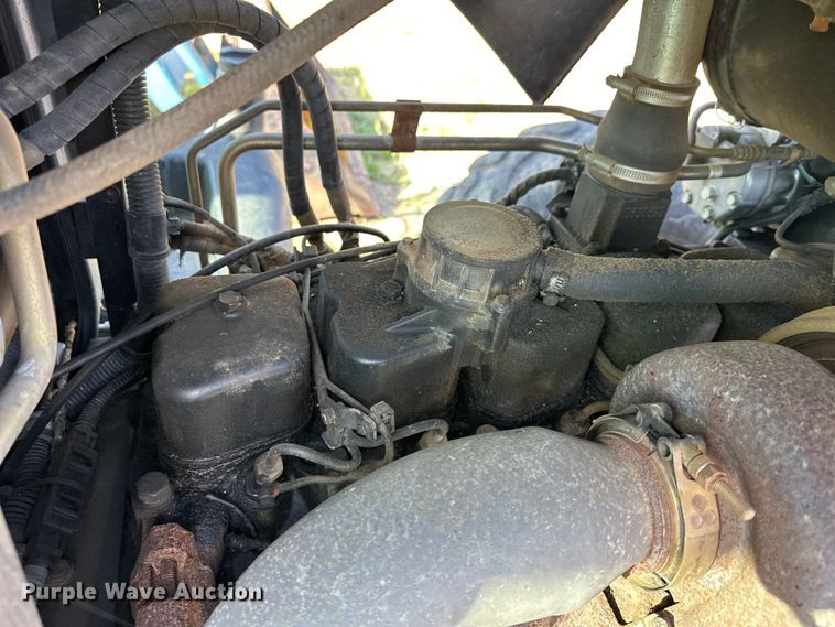 image for item EJ8877 2004 New Holland  TS115A MFWD tractor