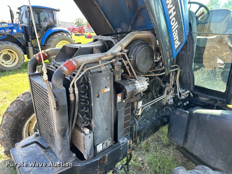 image for item EJ8877 2004 New Holland  TS115A MFWD tractor