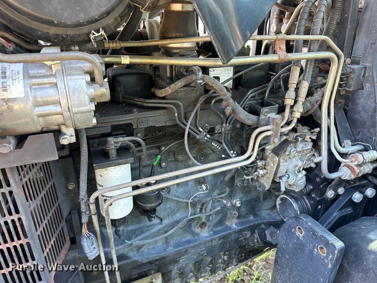 image for item EJ8877 2004 New Holland  TS115A MFWD tractor