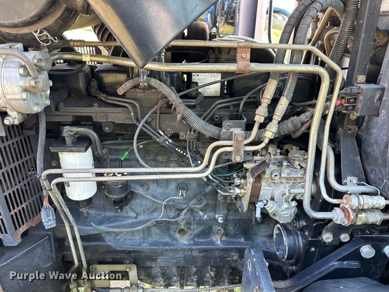 image for item EJ8877 2004 New Holland  TS115A MFWD tractor