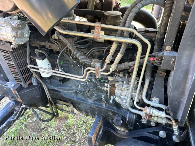 image for item EJ8877 2004 New Holland  TS115A MFWD tractor