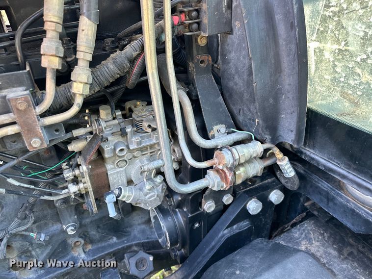 image for item EJ8877 2004 New Holland  TS115A MFWD tractor