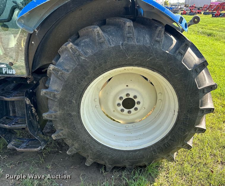 image for item EJ8877 2004 New Holland  TS115A MFWD tractor