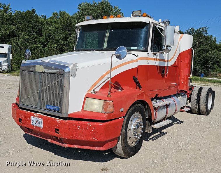 image for item NX9005 1994 White GMC  WIA semi truck