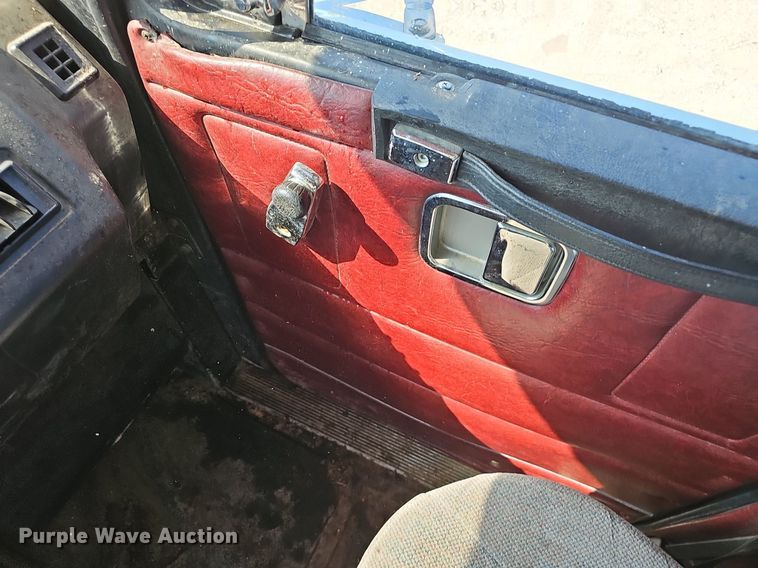 image for item NX9005 1994 White GMC  WIA semi truck