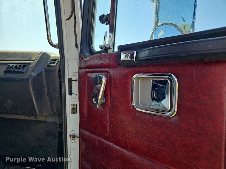 image for item NX9005 1994 White GMC  WIA semi truck