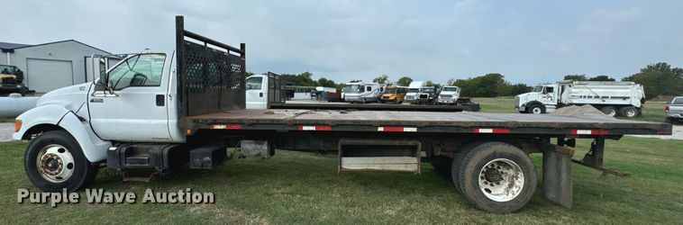 image for item DX1127 2000 Ford F650 Super Duty XL dump flatbed truck