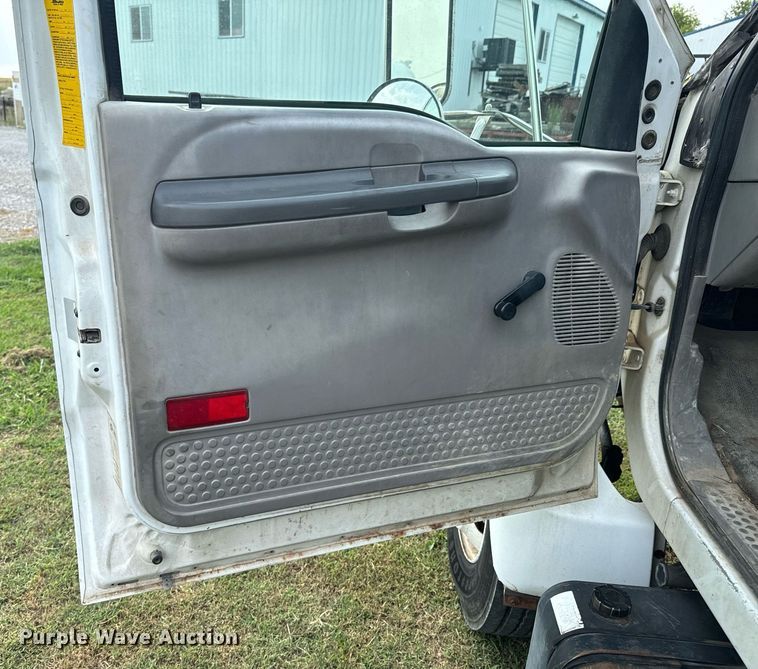 image for item DX1127 2000 Ford F650 Super Duty XL dump flatbed truck