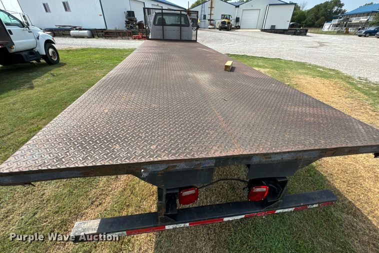 image for item DX1128 2006 Ford F750 Super Duty XL flatbed truck