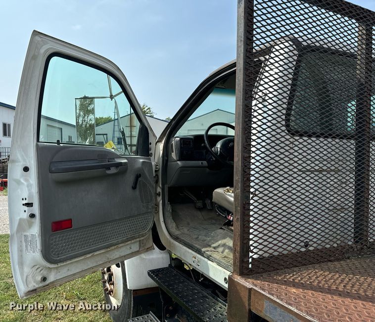 image for item DX1128 2006 Ford F750 Super Duty XL flatbed truck