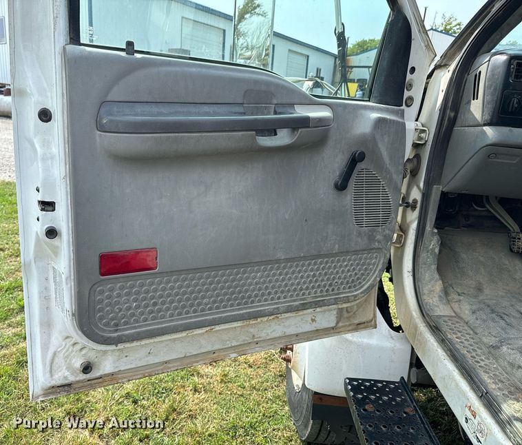 image for item DX1128 2006 Ford F750 Super Duty XL flatbed truck