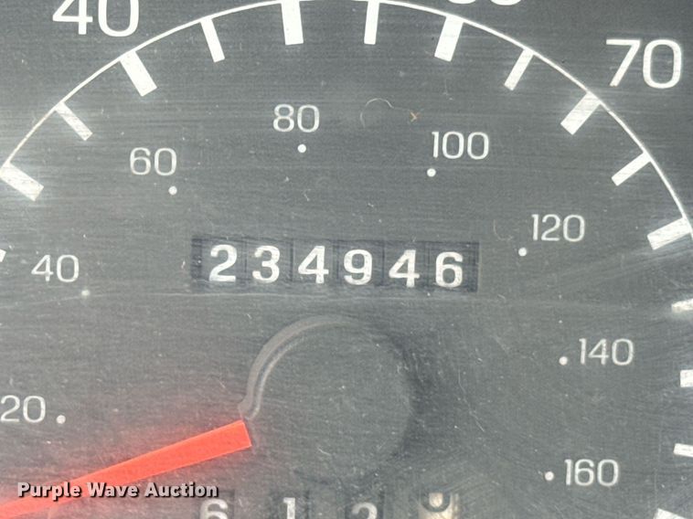 image for item DX1128 2006 Ford F750 Super Duty XL flatbed truck