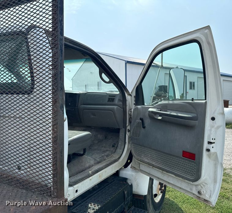 image for item DX1128 2006 Ford F750 Super Duty XL flatbed truck