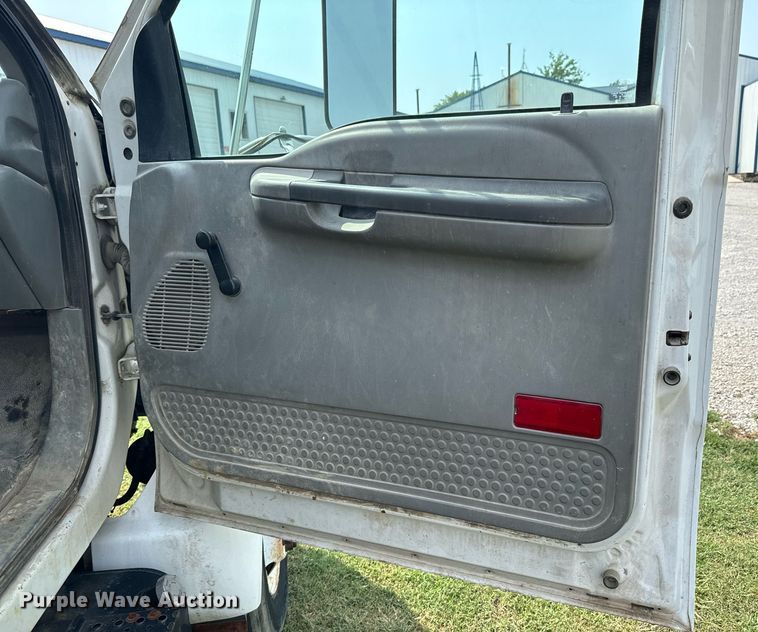 image for item DX1128 2006 Ford F750 Super Duty XL flatbed truck