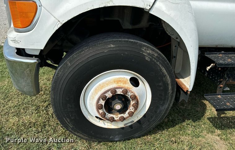 image for item DX1128 2006 Ford F750 Super Duty XL flatbed truck