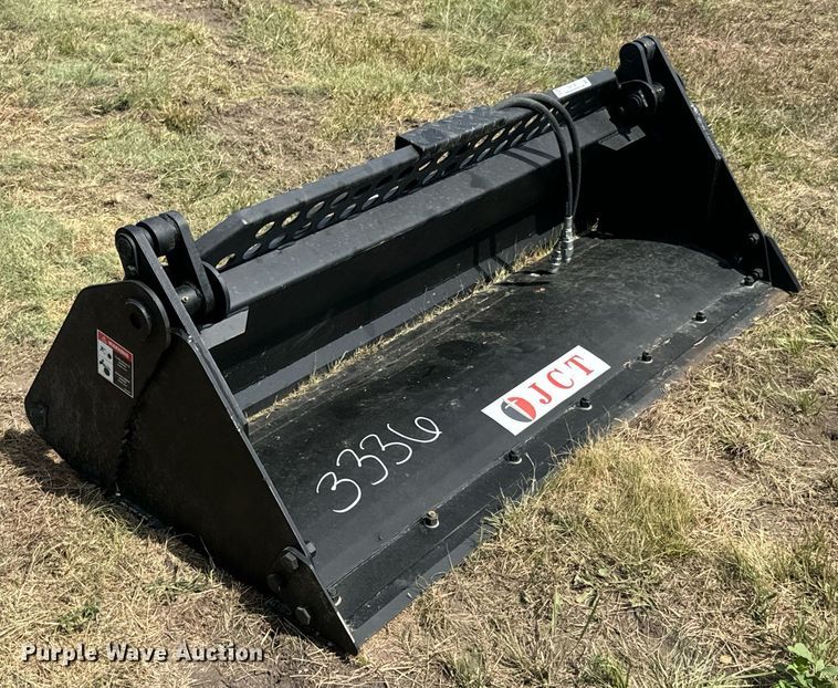 image for item DX1197 JCT Attachments four-in-one skid steer bucket