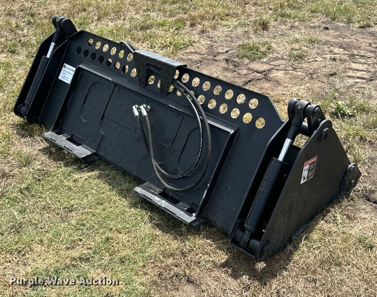 image for item DX1197 JCT Attachments four-in-one skid steer bucket