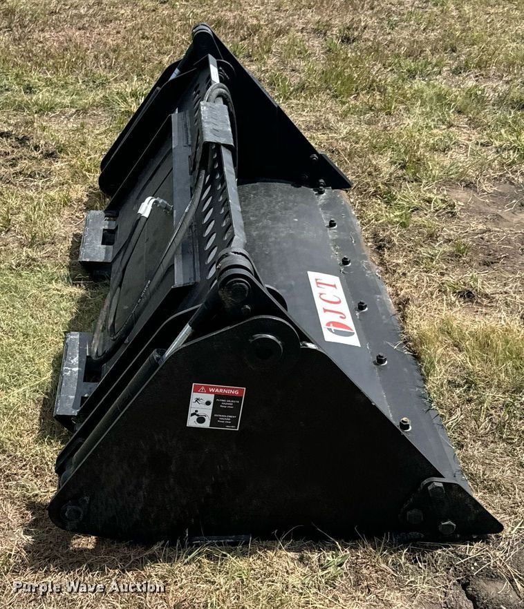 image for item DX1197 JCT Attachments four-in-one skid steer bucket