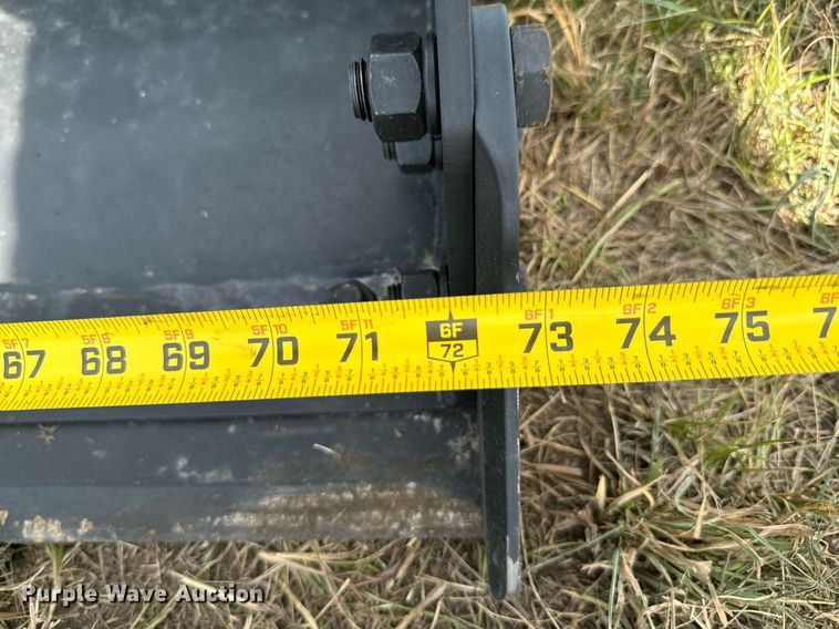 image for item DX1197 JCT Attachments four-in-one skid steer bucket